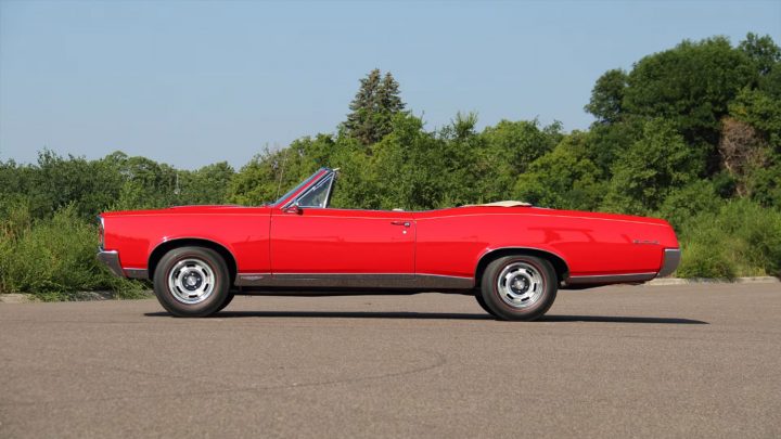 Side profile view of the 1967 Pontiac GTO convertible heading to auction.
