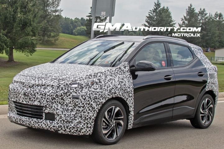 Camo 2027 Chevy Bolt EV front three quarter angle.