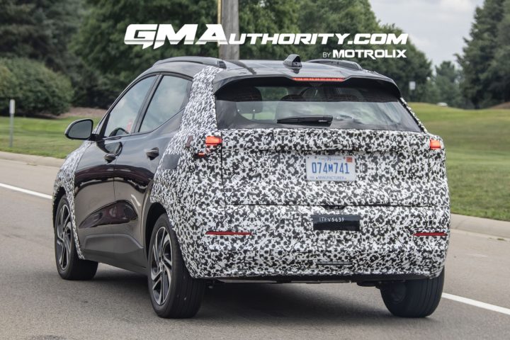 Camo 2027 Chevy Bolt EV rear three quarter angle.