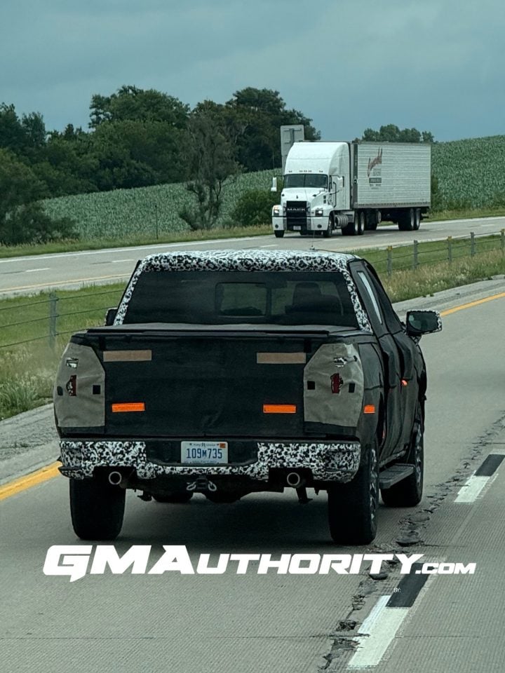A photo of a 2027 Silverado 1500 prototype with placeholder dual exhaust tips.