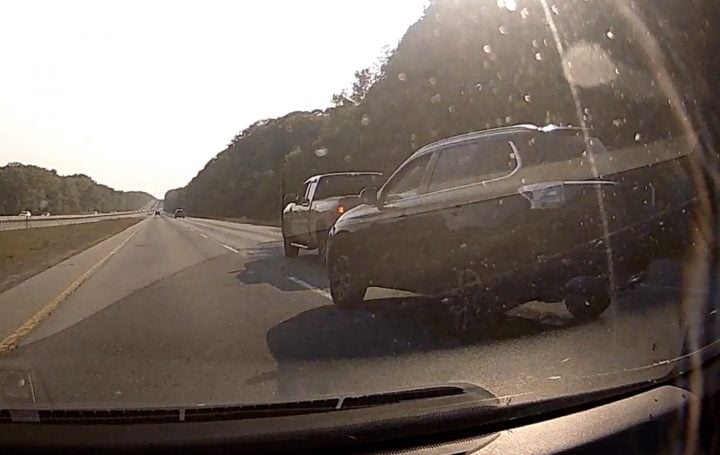 Chevy Silverado brake-checks a crossover.