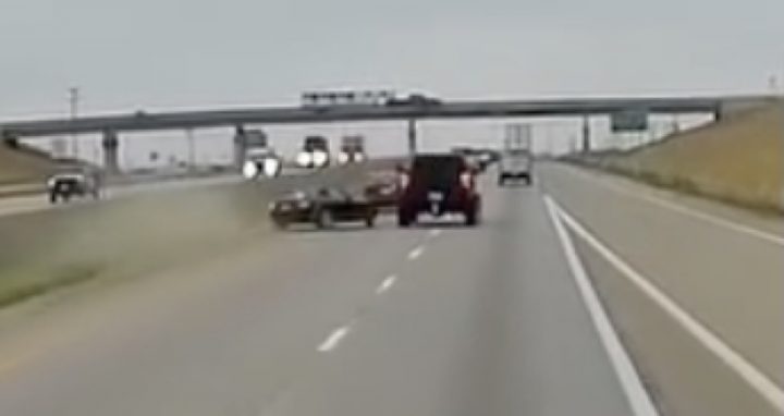 Chevy Silverado cuts off Mazda Miata.