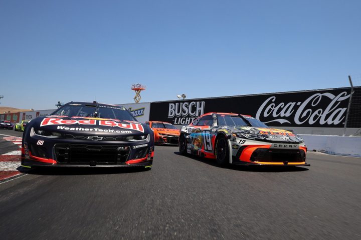 Photo of the No. 88 NASCAR Chevy of Shane van Gisbergen next to the No. 19 Toyota of Chase Briscoe at Sonoma. Van Gisbergen held off Briscoe for the win.