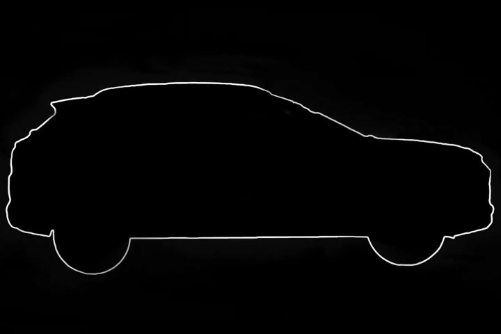 side profile outline of the upcoming Chevy Onix crossover in the teaser image.